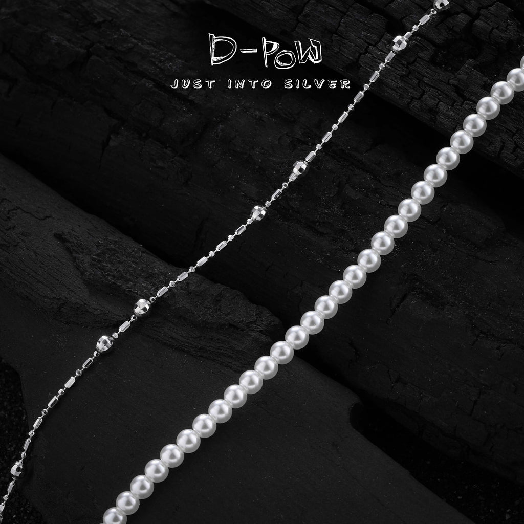 Detailed shot of the adjustable chain and clasp of the Baroque Bloom necklace in sterling silver.