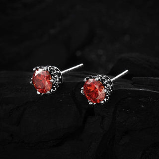 Angled view of the red Baroque Bloom Earrings, highlighting the vivid enamel and elegant flower-like shape.