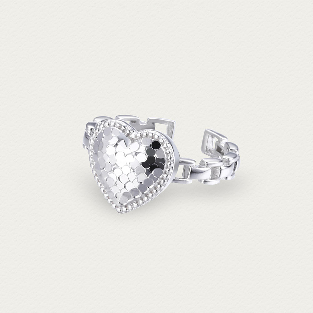 Front view of the Crushed Ice Heart 925 sterling silver ring, featuring a sleek band with a sparkling heart-shaped texture.
