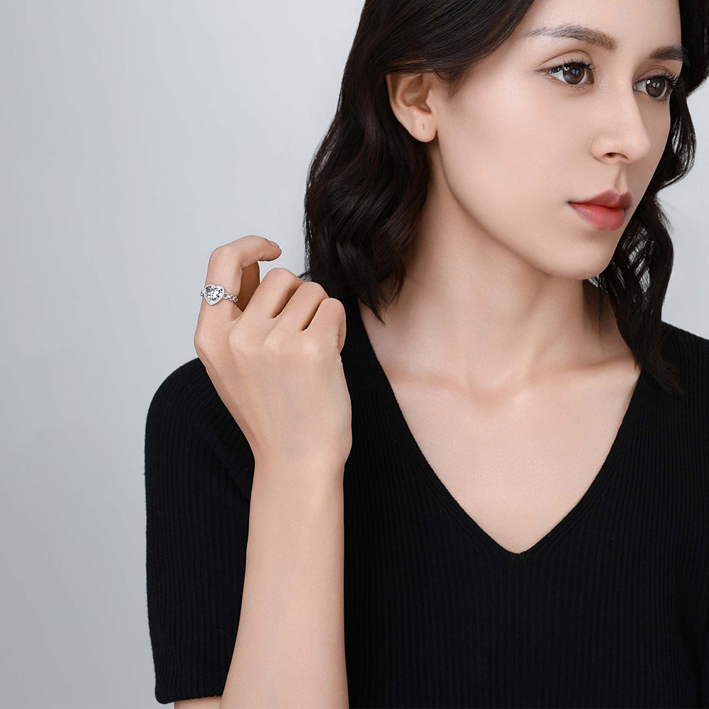 Model wearing the Crushed Ice Heart ring on hand, illustrating its elegant sparkle in daily styling.