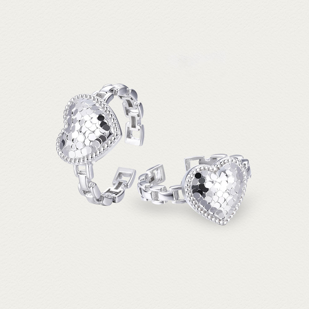 Alternate side angle of the Crushed Ice Heart silver ring, emphasizing the crushed texture and adjustability.