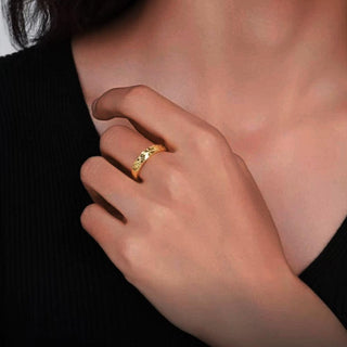 Model wearing the gold Crushed Ice Statement Ring, showing how the statement piece enhances the overall look with its bold and textured design.