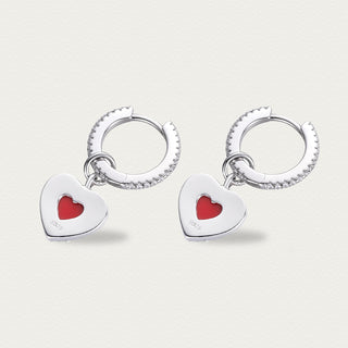 Side angle of the Cupid's Heart earrings showing the delicate silver frame and dangling heart agate.