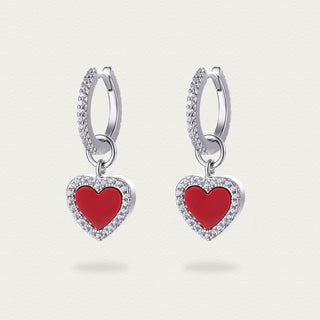 Alternate side view of the red heart agate drop earrings, highlighting the three-dimensional drop design.