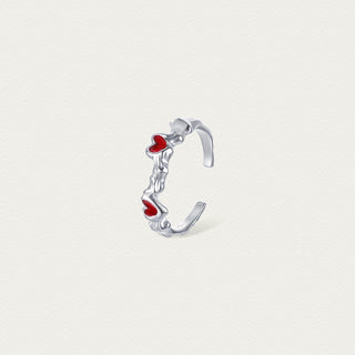 Front view of the Cupid's Heart Ring in silver, highlighting the delicate heart-shaped design and polished finish.