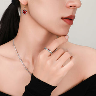 Model wearing the Cupid's Heart Ring in silver, showcasing how the ring fits gracefully on the finger with a stylish and timeless look.