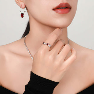 Another view of the model wearing the Cupid's Heart Ring in silver, highlighting the heart design as it catches the light.