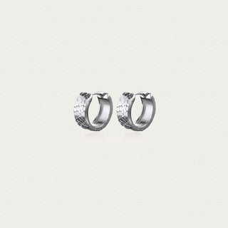 D-POW hammered sterling silver ear cuffs in S size, featuring a smooth and sleek design with a hammered texture, displayed on a simple white background.