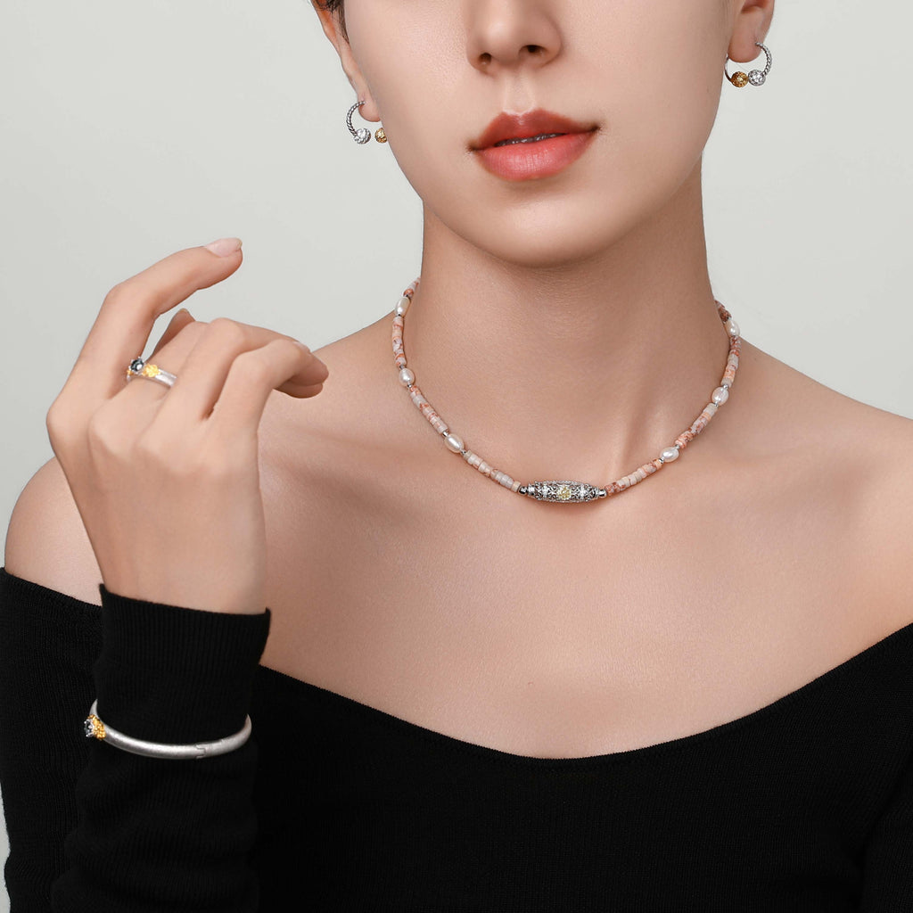Side profile of the bangle on the model, showcasing its graceful curvature and detailed craftsmanship.