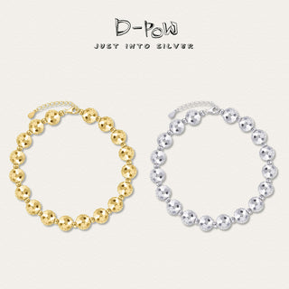 D-POW Frozen Echo Fractured Cosmos sterling silver bracelets in silver and gold, displayed together to emphasize the dual-tone elegance.