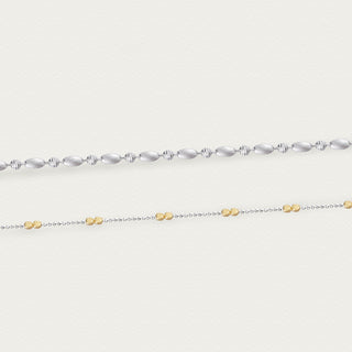 Close-up of the Ice Crystal necklace pendant, showcasing intricate faceting and elegant gold and silver finish.