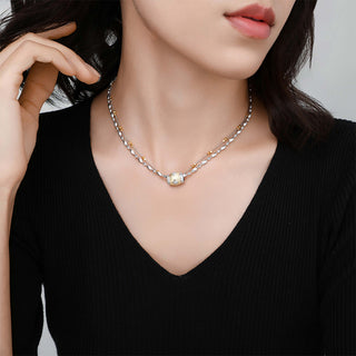 Model wearing the Ice Crystal Small Silver Diamond Necklace, showcasing its elegant silver glow and delicate charm.