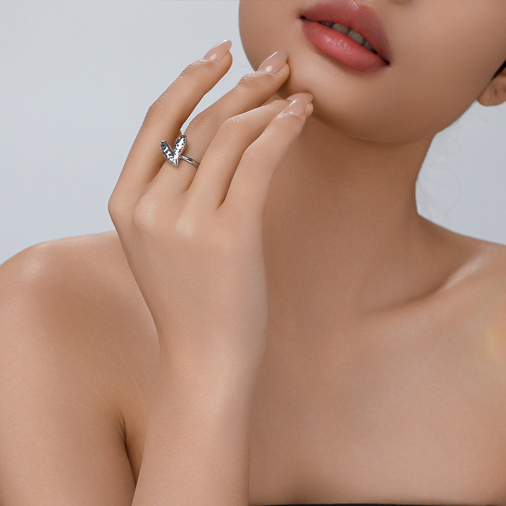 Alternate view of the model showcasing the Icy Peach adjustable silver ring, highlighting its soft luster and elegant fit.