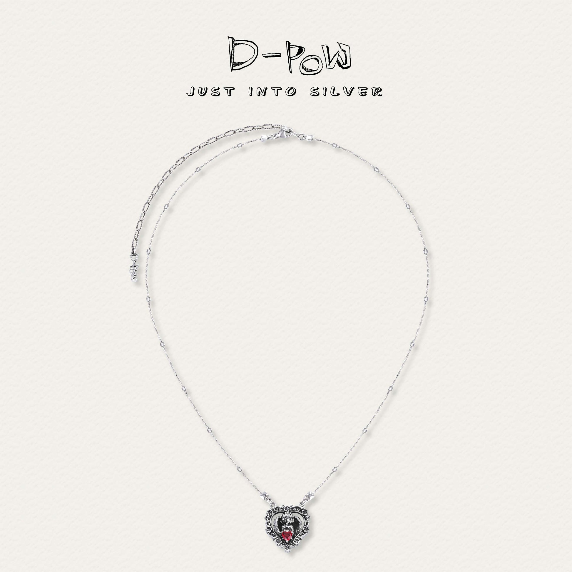 D-POW Seraph's Silence heart-shaped red gem sterling silver necklace, showcasing its elegant design and vibrant gemstone.