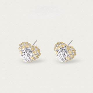 Side view of gold iced heart studs, revealing the elegant depth and sculpted contours.