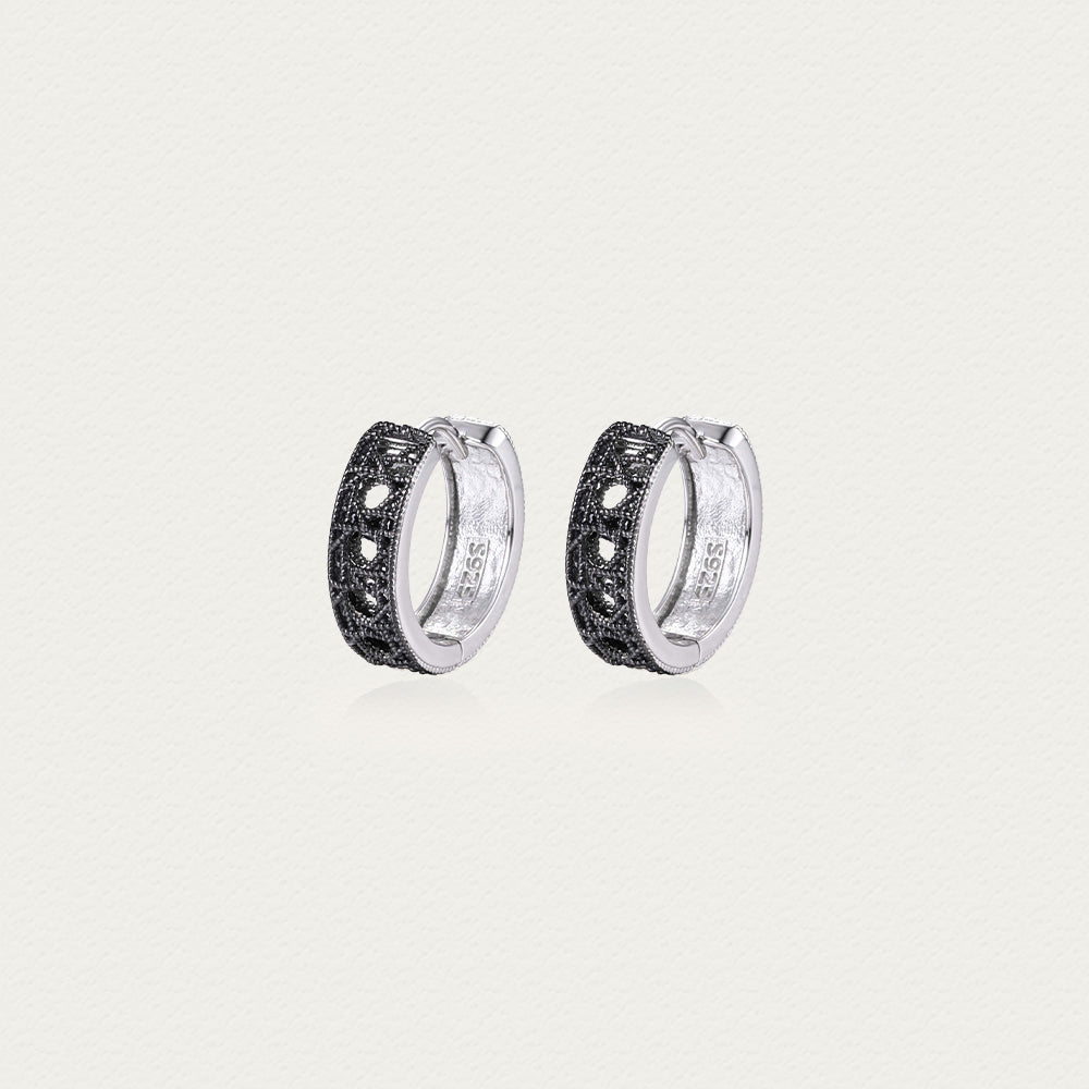 Tindall Light ear clip in black finish, featuring intricate ice crystal lace pattern with a bold, elegant look.