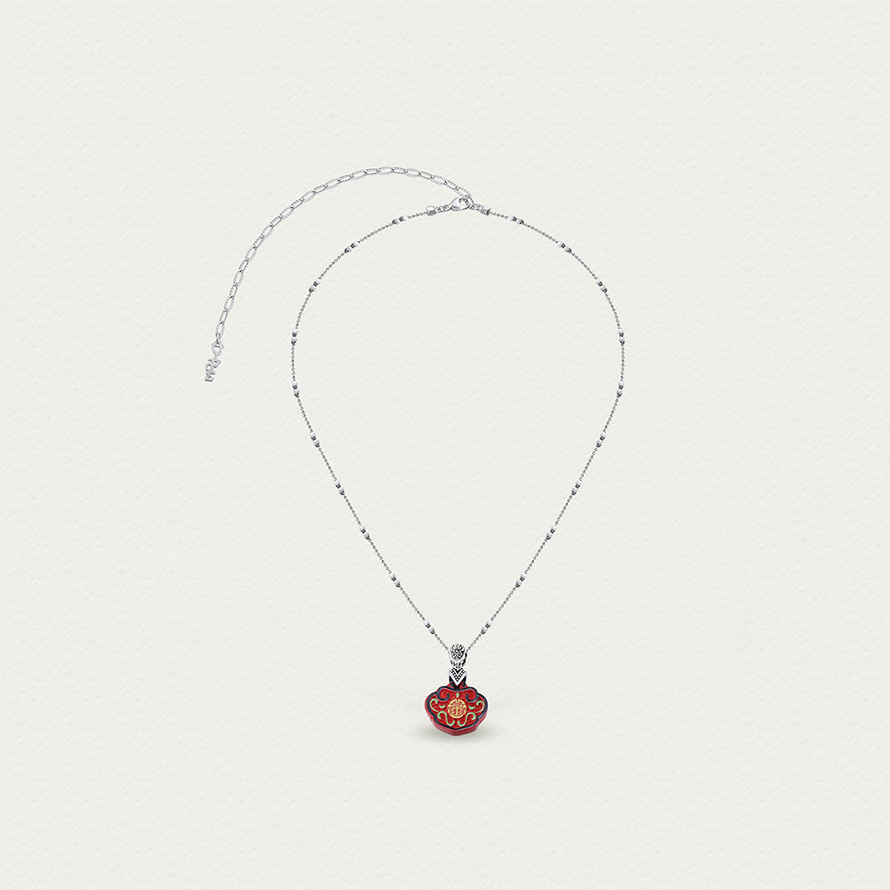 Full view of the Tranquility and Joy necklace, featuring laser-cut square beads arranged on a sleek chain.