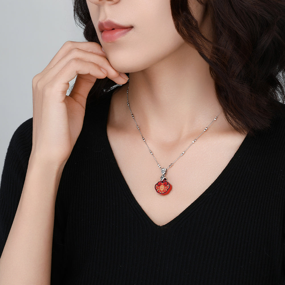 Model wearing the Tranquility and Joy necklace, showing how the square beads rest gently along the collarbone.