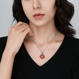 Side view of model wearing the necklace, highlighting the geometric bead design and subtle shine.