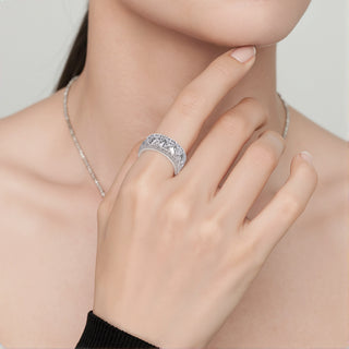 Model wearing the Tyndall Light ring, displaying its refined shimmer and statement ice-inspired silhouette.